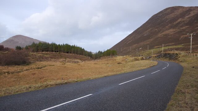 Static shot of the main road near the village of Northton in Harris.