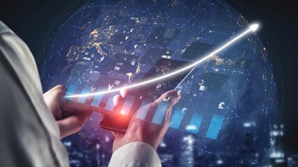 Naklejka premium A person interacts with a smartphone while viewing dynamic business analytics and growth charts on a digital globe, illustrating modern financial trends and technology. Copula