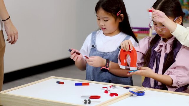 Young Students Learning Physics with Magnets in a Science Classroom