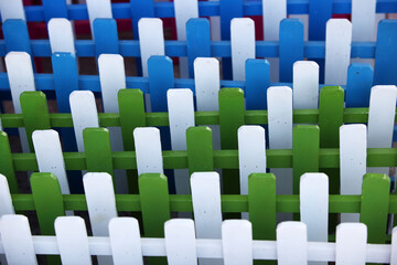 Fototapeta premium Colorful Wooden Fence Pattern with Vertical and Horizontal Elements