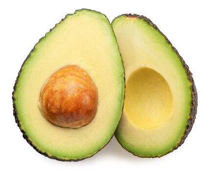 Halves of hass avocado fruits isolated on white background. File contains clipping paths.