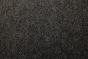 Fototapeta premium Dark gray felt fabric textile texture background