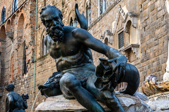 Bronze satyr statue on the Fountain of Neptune in Piazza della Signoria, Florence, Tuscany, Italy