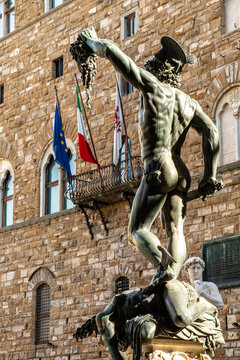 Perseus with the Head of Medusa statue by Cellini and David by Michelangelo in Piazza della Signoria, Florence, Italy