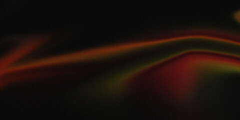 Fototapeta premium A Dark Background With Blurred Red And Green Light Streaks Moving Across