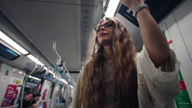 Woman tourist rides in Singapore subway. Travel and tourism urban public transport in Asia, travel.