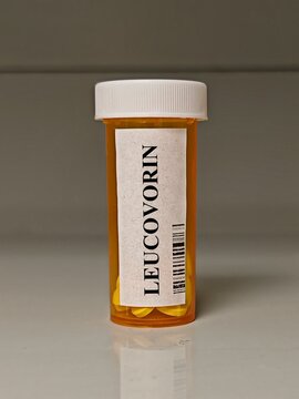 Box of LEUCOVORIN 5mg tablets on a hospital pharmacy table used to reduce methotrexate toxicity a folinic acid supplement.