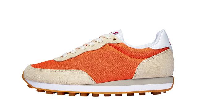 Isolated casual retro athletic sneaker in vibrant orange and beige suede, stylish and comfortable footwear.