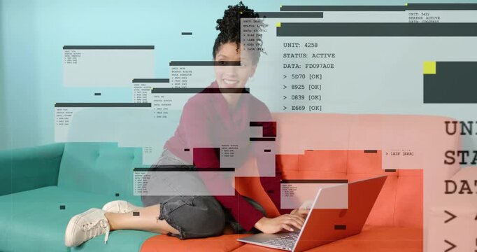 Vertical video: Woman working, typing on laptop growing tech overlays and STATUS block hiding face