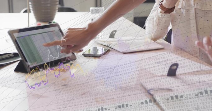 Woman tapping tablet, dragging chart, highlighting line graphs across table for business review