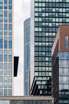 Urban lines and modern office skyscrapers form highrise architecture city perspective in Frankfurt Germany near elevated walkway downtown
