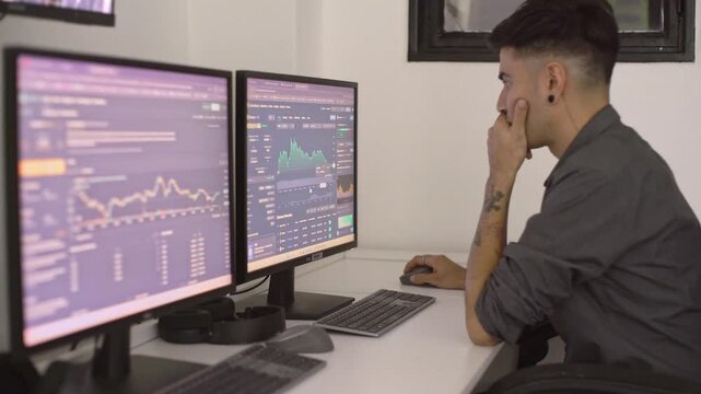 Stock trader carefully examining cryptocurrency market trends on multiple computer screens, displaying professional data analysis in modern office workspace