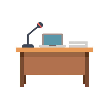 A desk with a laptop and a microphone