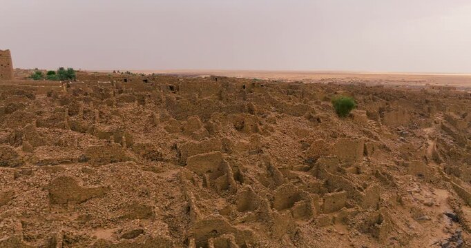 A View Of Abandoned Ancient Stone Ruins At The Historic Town Of Ouadane In Mauritania. Aerial Drone Shot