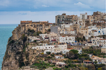Obraz premium Peschici town on cliff overlooking Adriatic Sea in Apulia