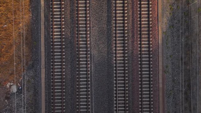 Multiple parallel railway tracks upwards pan