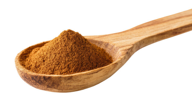 Isolated rustic wooden spoon filled with a mound of ground aromatic spice powder.