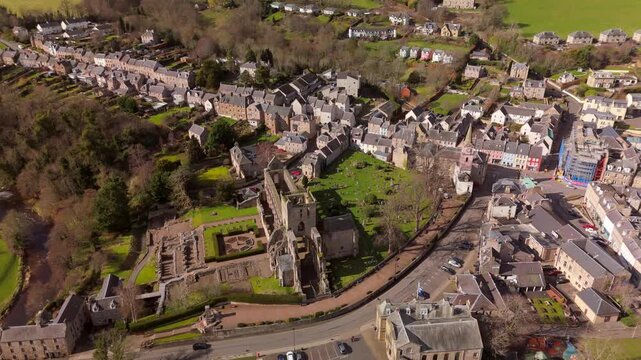 Jedburgh Scotland: 14th March 2026: Drone view of Jedburgh, Scottish Borders. Jedburgh Abbey stands near town buildings and hills
