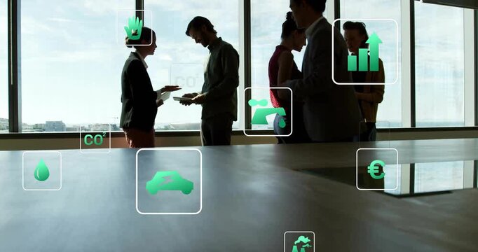 Team swapping papers tapping phones, animating eco and finance icons over table comparing data
