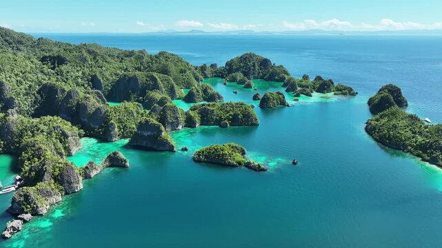Papua; sea; sun; air; water; color; green; blue; west; forest; holiday; travel; boat; yacht; live; cloud; southwest; Pacific; New Guinea; island; Indonesia; Australia; Solomon Islands