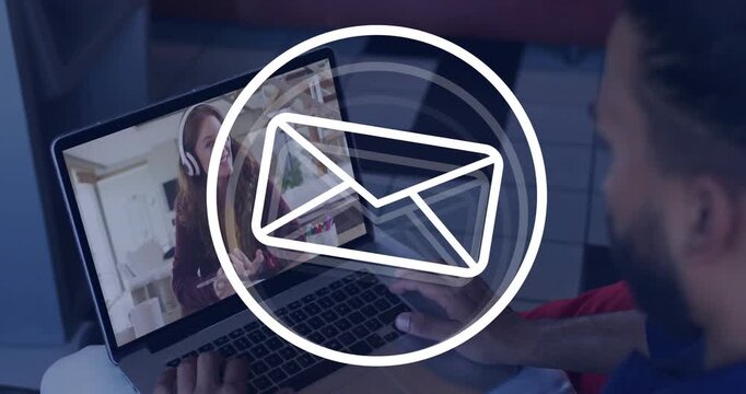 Man on laptop typing as glyph morphing into envelope overlay over screen, signaling business mail