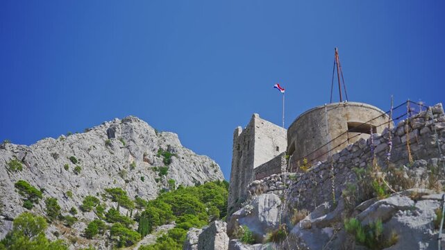 Medieval Mirabella fortress Peovica on the rocks in Omis.
