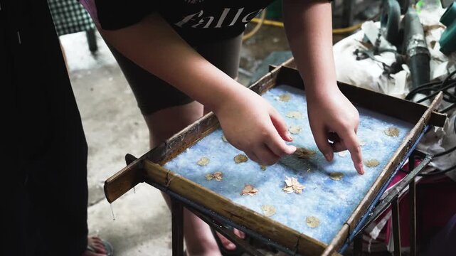 Children learning traditional handmade sa paper craft making process