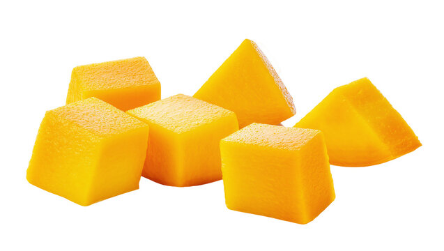 Isolated fresh ripe mango fruit cut into cubes and slices, healthy tropical food ingredients