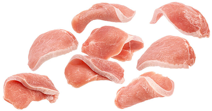 Falling raw pork loin, fresh boneless meat cuts isolated on white background, full depth of field