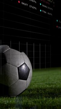 Vertical video: Soccer ball on turf, blur carrying it away, revealing sports chart with 2