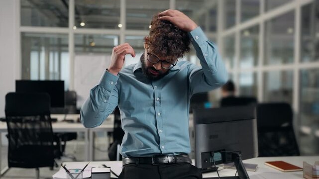 Arabian businessman touching fixing hair beard glasses stand in office ethnic business man male guy specialist stylish employer fix touch correct hairstyle bearded executive correcting haircut curls