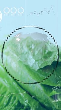 Vertical video: Camera zooming into leaf, agri HUD ring tracking map dots and logging moisture data