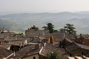 Obraz premium Autumn Rooftops and Hills of Montepulciano, Tuscany, Italy