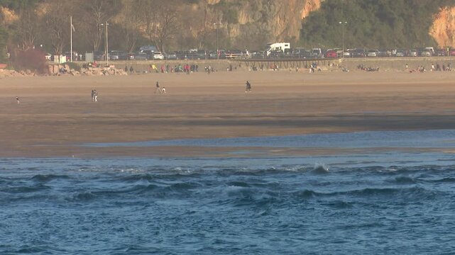 Scenic view of Urdaibai wetland in Bizkaia, a biosphere reserve and key migratory bird habitat. Natural marsh landscape with tidal waters, vegetation, and peaceful environmental biodiversity.