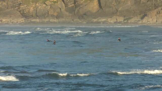 Scenic view of Mundaka on the Cantabrian coast in Bizkaia, famous worldwide for its powerful left-hand surf wave. Coastal town landscape with ocean swell, harbor, and natural surroundings.