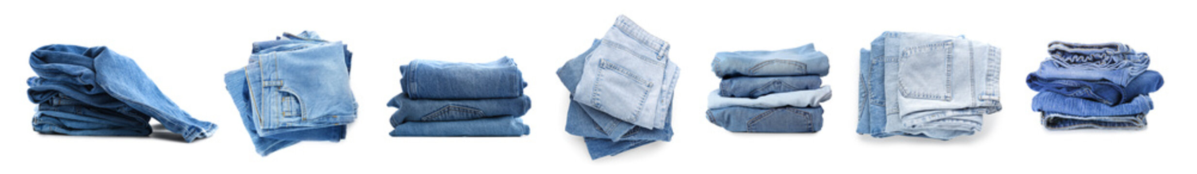 Set of stacked jeans clothes on white background