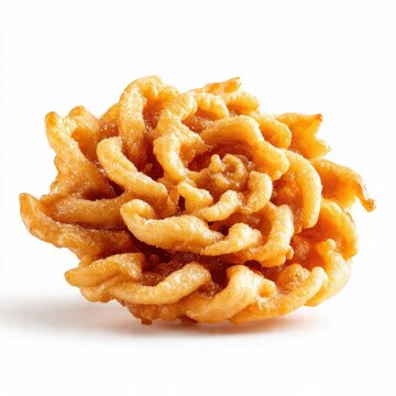 Traditional deep-fried rosette cookie or Achappam isolated on white background, crispy flower-shaped pastry