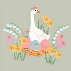 Spring goose with easter eggs and flowers in a nest © veroinesc