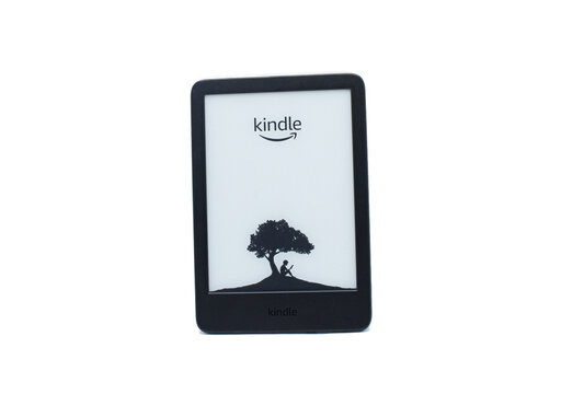 Kindle is a portable e-reader developed by Amazon that uses E Ink technology to simulate paper for reading e-books, magazines, and documents. isolated on white