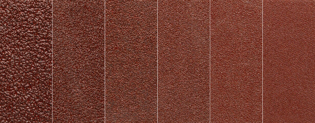 Collection of sandpaper textures showing different grit sizes from coarse to fine.