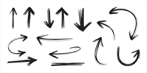 Fototapeta premium Collection of hand drawn brush stroke arrows doodle style vector graphic elements