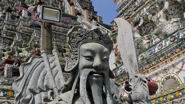 Decorative tile setting features warrior figure wielding sword Wat Arun