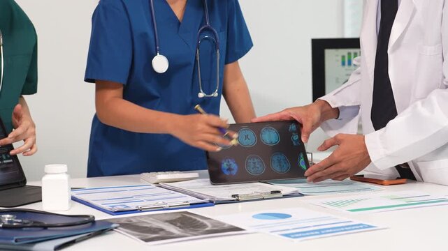 Medical team working on digital tablet healthcare doctor technology tablet using computer analyzed the results of medical reports.