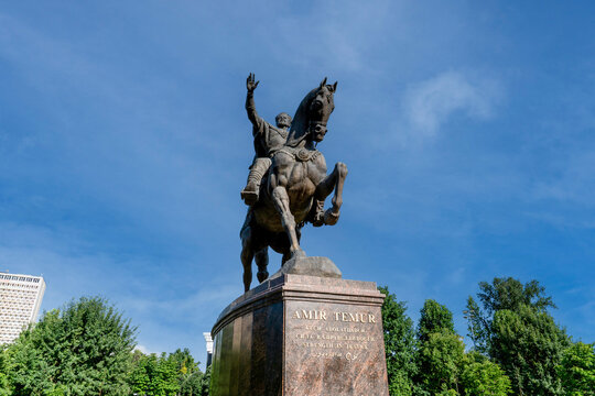 Tashkent (Toshkent), Uzbekistan (O'zbekiston) - May 26, 2025: Low angle view of the Amir Temur Monument, a bronze equestrian statue of the historical leader in the heart of the capital city.