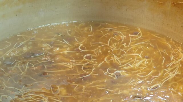 Hot fish maw soup in a pot.