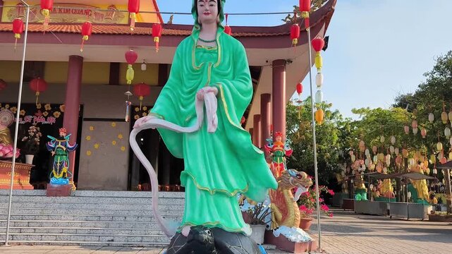 Cinematic - Green Jade Stone Statue of Guan Yin Bodhisattva at Pagoda Temple