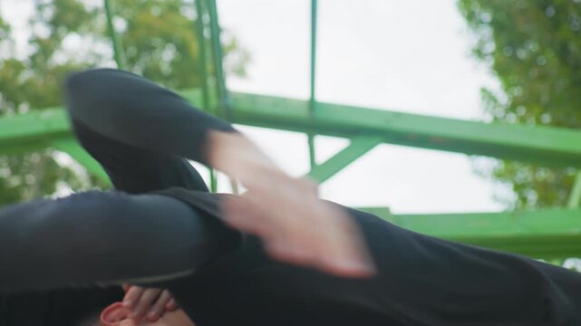 close clinch between two white men focused control drill emphasizing neck hold escape technique coachlike instruction leafy outdoor gym backdrop concentrated athletic intensity restrained pace