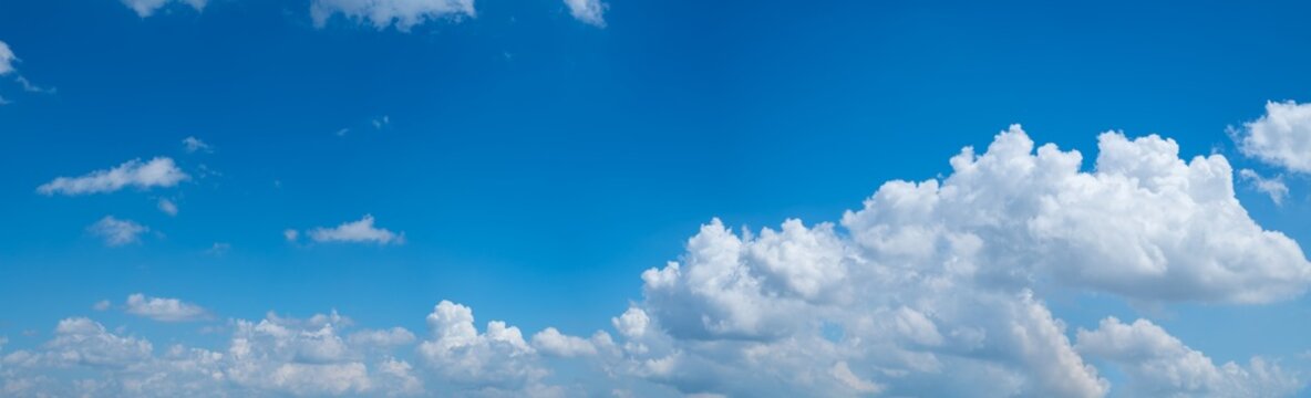 Panoramic blue sky with white clouds. Nature background.