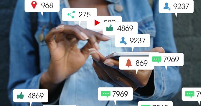Woman tapping smartphone, causing social icons to multiply around hands while checking alerts
