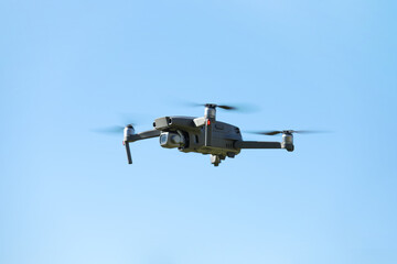 Fototapeta premium The drone copter flying with digital camera.